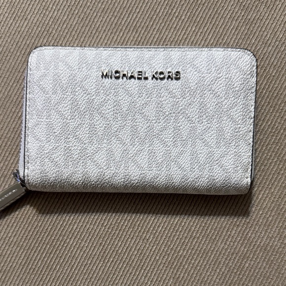 Michael Kors Handbags - Michael Kors Silver Wallet